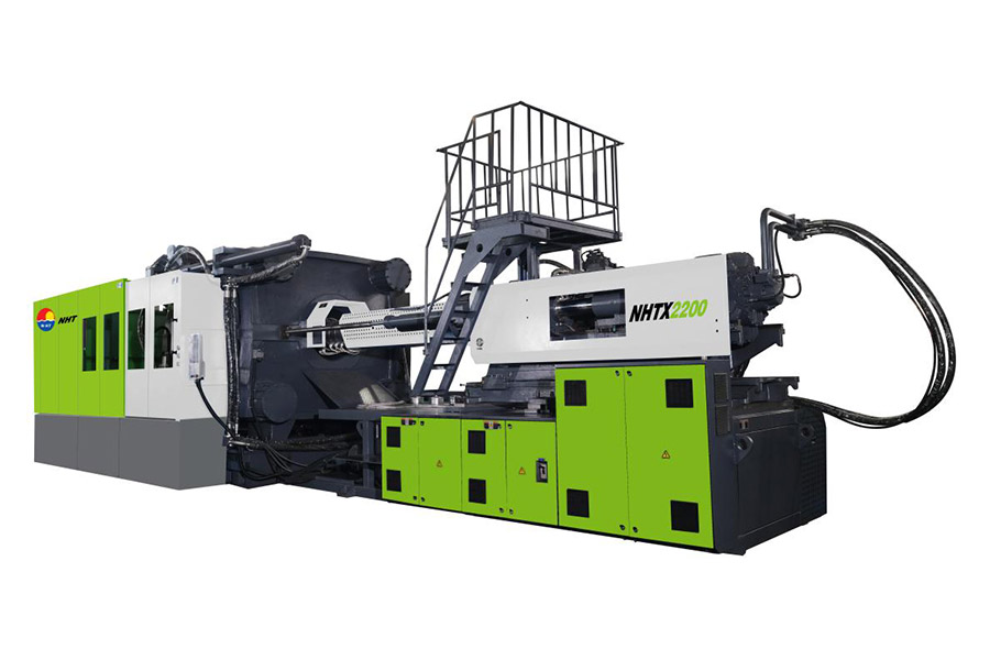 Large injection molding machine for two plates